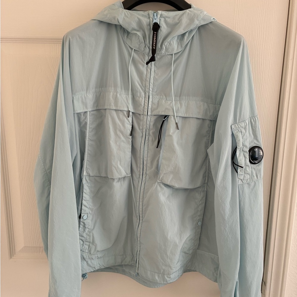C.P. Company Sky Blue Jacket with Black Lens Detail